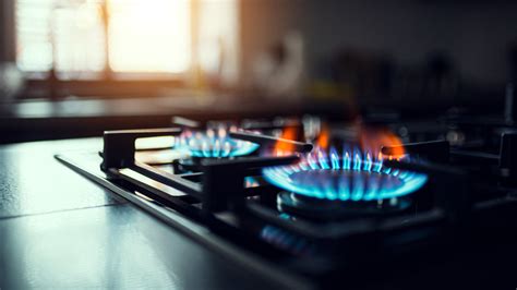 gas stove not lighting but clicking gas smell